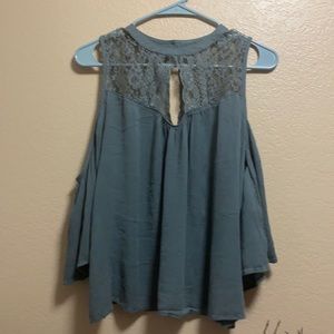 Cold shoulder top with lace. Keyhole cutout in the back. Size Large. very pretty